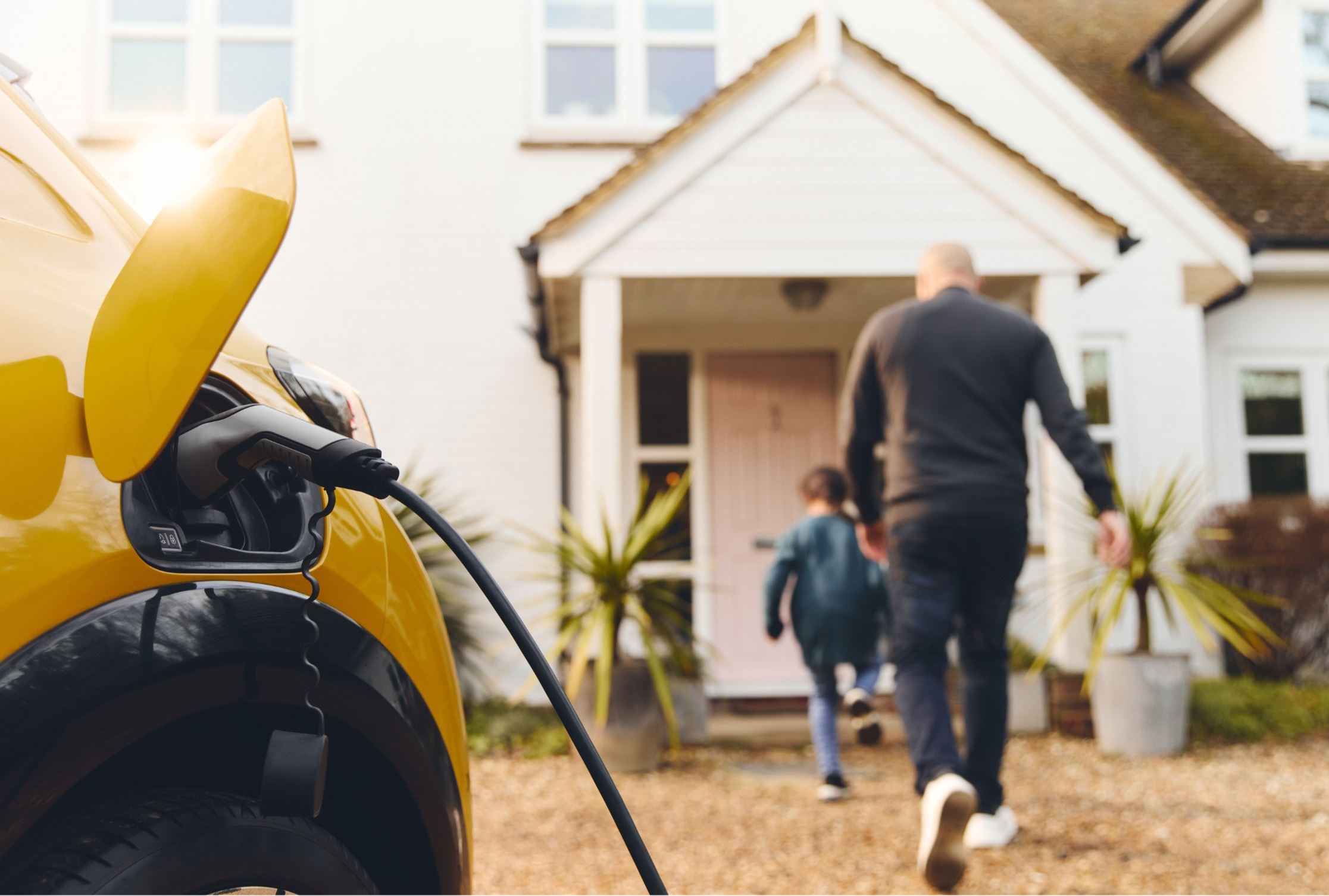 Car charging outside a residential home